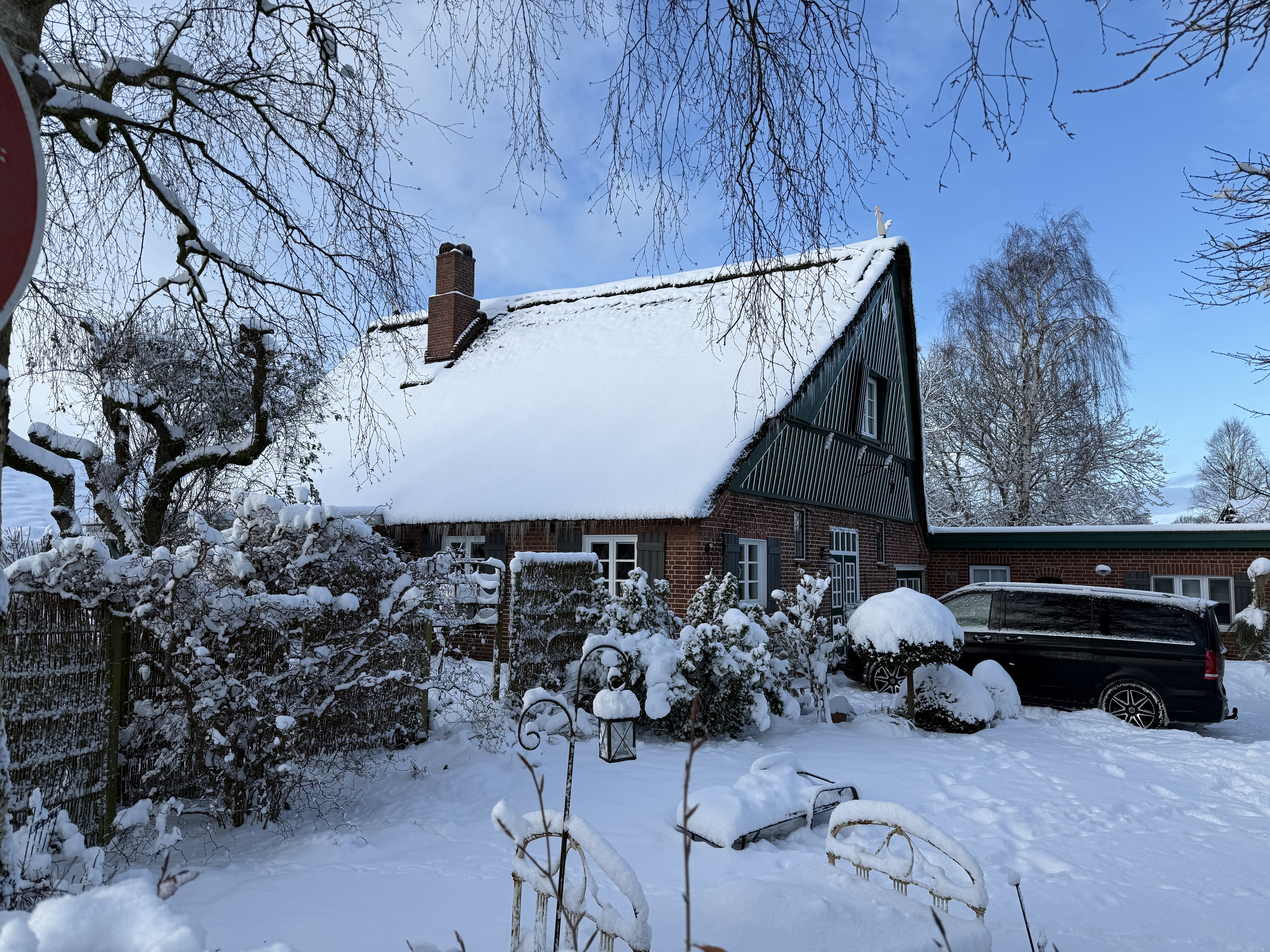 Thatched farmhouse in winter